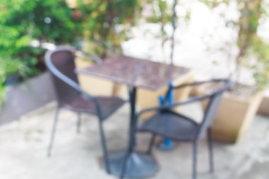 imaeg Restaurant (bulanık sıcak turuncu ışıklar ile bulanık bokeh arka plan).