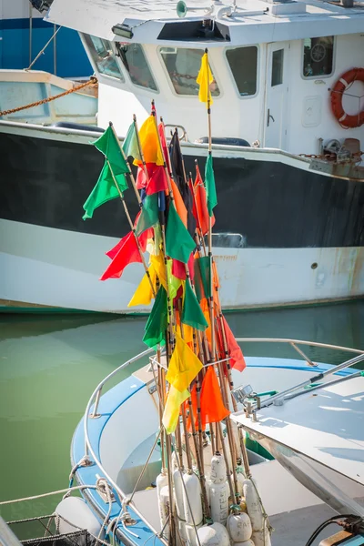 Bunch of flags with fishing float — Stock Photo, Image