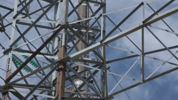 Complicated metal structure of electrical power line tower — Stock Video