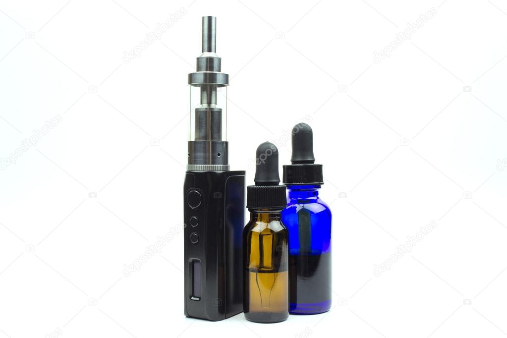 E-cigarette (tank) with a couple bottles of juice