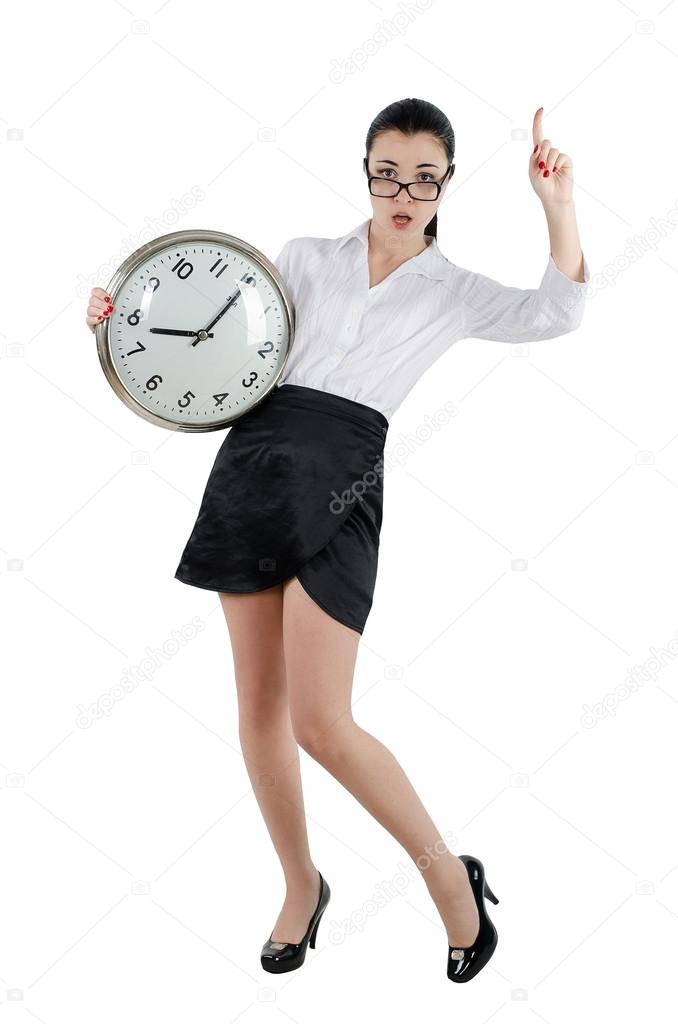 Business woman holding a big clock