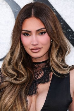 Canadian model, influencer, reality TV star, and entrepreneur Francesca Farago arrives at the World Premiere Of Universal Pictures And Blumhouse Productions' 'Black Phone 2' held at the TCL Chinese Theatre IMAX on October 8, 2025 in Hollywood