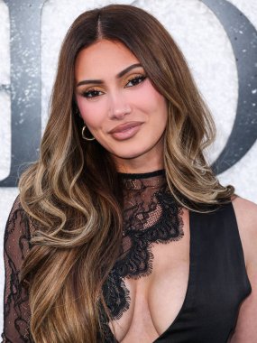 Canadian model, influencer, reality TV star, and entrepreneur Francesca Farago arrives at the World Premiere Of Universal Pictures And Blumhouse Productions' 'Black Phone 2' held at the TCL Chinese Theatre IMAX on October 8, 2025 in Hollywood