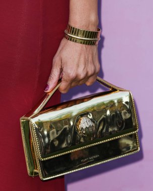 Purse of Canadian-American actress Emmanuelle Chriqui arrives at the 35th Annual EMA (Environmental Media Association) Awards Gala 2025 held at CBS Radford Studio Center on October 11, 2025 in Studio City, Los Angeles, California, United States.