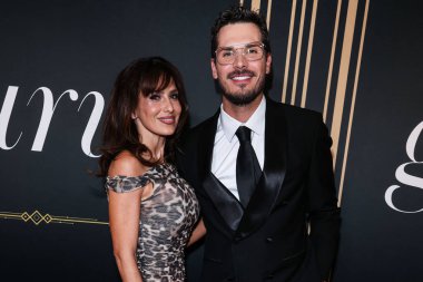 American yoga instructor, entrepreneur, podcaster, and author Hilaria Baldwin and Russian choreographer and dancer Gleb Savchenko arrive at the 2nd Annual Gurus Awards Presented by Gurus Magazine held at Cicada Restaurant 