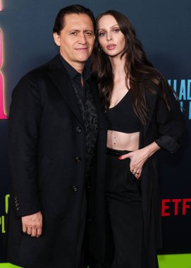 American actor Clifton Collins Jr. and American actress Bailee MyKell Cowperthwaite arrive at Los Angeles Special Screening Of Netflix's 'Ballad Of A Small Player' held at Egyptian Theatre Hollywood on October 14, 2025 in Hollywood, CA, LA, USA.