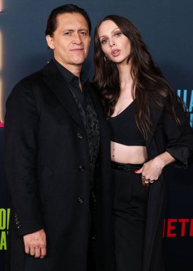 American actor Clifton Collins Jr. and American actress Bailee MyKell Cowperthwaite arrive at Los Angeles Special Screening Of Netflix's 'Ballad Of A Small Player' held at Egyptian Theatre Hollywood on October 14, 2025 in Hollywood, CA, LA, USA.