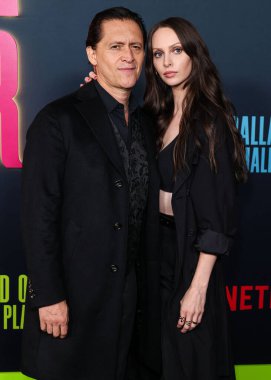 American actor Clifton Collins Jr. and American actress Bailee MyKell Cowperthwaite arrive at Los Angeles Special Screening Of Netflix's 'Ballad Of A Small Player' held at Egyptian Theatre Hollywood on October 14, 2025 in Hollywood, CA, LA, USA.