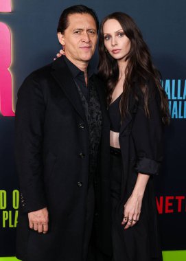 American actor Clifton Collins Jr. and American actress Bailee MyKell Cowperthwaite arrive at Los Angeles Special Screening Of Netflix's 'Ballad Of A Small Player' held at Egyptian Theatre Hollywood on October 14, 2025 in Hollywood, CA, LA, USA.