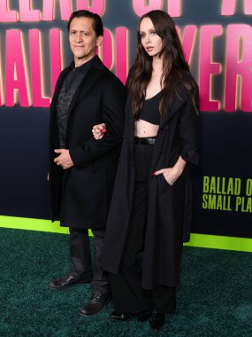 American actor Clifton Collins Jr. and American actress Bailee MyKell Cowperthwaite arrive at Los Angeles Special Screening Of Netflix's 'Ballad Of A Small Player' held at Egyptian Theatre Hollywood on October 14, 2025 in Hollywood, CA, LA, USA.