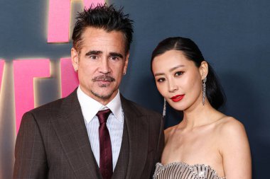 Irish actor Colin Farrell and Chinese-American actress and singer Fala Chen arrive at the Los Angeles Special Screening Of Netflix's 'Ballad Of A Small Player' held at The Egyptian Theatre Hollywood on October 14, 2025 in Hollywood, LA, CA, USA.