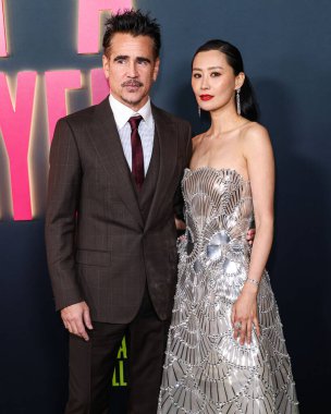 Irish actor Colin Farrell and Chinese-American actress and singer Fala Chen arrive at the Los Angeles Special Screening Of Netflix's 'Ballad Of A Small Player' held at The Egyptian Theatre Hollywood on October 14, 2025 in Hollywood, LA, CA, USA.