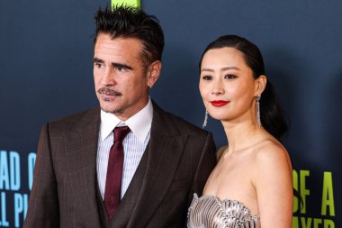 Irish actor Colin Farrell and Chinese-American actress and singer Fala Chen arrive at the Los Angeles Special Screening Of Netflix's 'Ballad Of A Small Player' held at The Egyptian Theatre Hollywood on October 14, 2025 in Hollywood, LA, CA, USA.