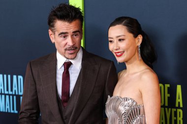 Irish actor Colin Farrell and Chinese-American actress and singer Fala Chen arrive at the Los Angeles Special Screening Of Netflix's 'Ballad Of A Small Player' held at The Egyptian Theatre Hollywood on October 14, 2025 in Hollywood, LA, CA, USA.