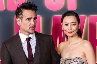 Irish actor Colin Farrell and Chinese-American actress and singer Fala Chen arrive at the Los Angeles Special Screening Of Netflix's 'Ballad Of A Small Player' held at The Egyptian Theatre Hollywood on October 14, 2025 in Hollywood, LA, CA, USA.