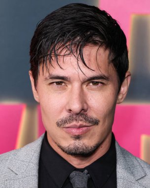 American actor, martial artist and model Lewis Tan arrives at the Los Angeles Special Screening Of Netflix's 'Ballad Of A Small Player' held at The Egyptian Theatre Hollywood on October 14, 2025 in Hollywood, Los Angeles, California, United States.