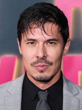 American actor, martial artist and model Lewis Tan arrives at the Los Angeles Special Screening Of Netflix's 'Ballad Of A Small Player' held at The Egyptian Theatre Hollywood on October 14, 2025 in Hollywood, Los Angeles, California, United States.