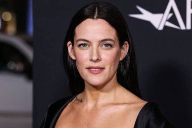 Amerikalı aktris Riley Keough, 23 Ekim 2025 'te Hollywood, Los Angeles, Kaliforniya, ABD' de düzenlenen TCL Çin Tiyatrosu IMAX 'te düzenlenen Netflix' in 'Jay Kelly' sinin galası olan Canva tarafından sunulan 2025 AFI (Amerikan Film Enstitüsü) festivaline geldi..