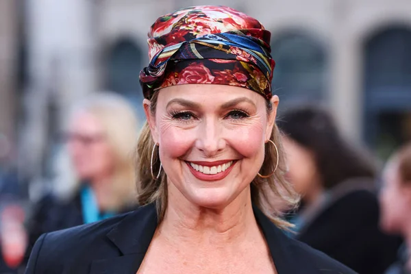  Yönetmen Melora Hardin, Canva tarafından sunulan 2025 AFI (Amerikan Film Enstitüsü) Festivali 'ne 26 Ekim 2025' te TCL Çin Tiyatrosu IMAX 'te düzenlenen Odak Özellikleri' nin 'Song Sung Blue' galasının kapanış gecesinde geldi.