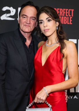 Amerikalı yönetmen, aktör ve yazar Quentin Tarantino ve kızı / İsrailli şarkıcı ve model aktris Daniella Pick Tarantino, 12 Kasım 2025 tarihinde Harmony Gold Theater 'da düzenlenen Şaban Filmlerinin' The Perfect Gamble 'filminin Los Angeles galasına geldiler.