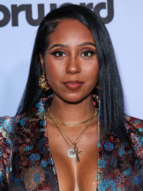 Khat Rabbani, 21 Kasım 2025 'te Beverly Hilton Oteli' nde düzenlenen 4. Geleneksel Femme It Forward 'Give her FlowHERS' ödül galasına geldi..   