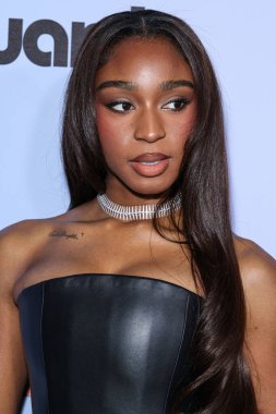 Amerikalı şarkıcı Normani Kordei Hamilton, 21 Kasım 2025 'te Beverly Hilton Oteli' nde düzenlenen 4. Geleneksel Femme It Forward 'Give her FlowHERS' ödül galasına geldi..    