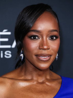 Amerikalı aktris Aja Naomi King, 20. Yıllık L 'Oreal Paris' in Değerli Kadınlar Kutlaması 2025 'e geldi. Akademi Sinema Müzesi 2 Aralık 2025' te Müze Sırası, Mucize Mile, Los Angeles, Kaliforniya, ABD 'de gerçekleşti..