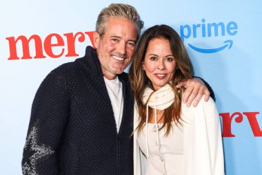 Triatloncu Scott Rigsby ve kız arkadaşı Amerikan TV kişiliği ve mankeni Brooke Burke, 4 Aralık 2025 'te Culver Tiyatrosu' nda düzenlenen 'Amazon Prime Video' nun Los Angeles Özel Gösterimi 'ne geldiler..