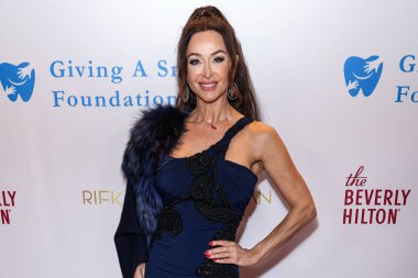 İsviçreli aktris Sofia Milos, Beverly Hilton Oteli 'nde 11 Aralık 2025' te düzenlenen Giving A Smile Foundation İlk Gala 2025 'e geldi..