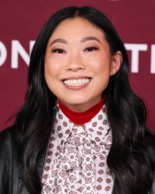 Amerikalı aktris ve rapçi Awkwafina (Nora Lum), 15 Aralık 2025 'te Hollywood, Los Angeles, Kaliforniya, ABD' de bulunan TCL Çin Tiyatrosu IMAX 'te düzenlenen Lionsgate' in 'The Housemaid' adlı filminin Los Angeles galasına geldi..