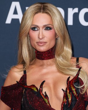 Amerikan medya kişiliği, modeli, aktris, şarkıcı, DJ ve girişimci Paris Hilton, 18 Aralık 2025 'te Hollywood Palladium' da düzenlenen TikTok Ödülleri 'ne ulaştı..
