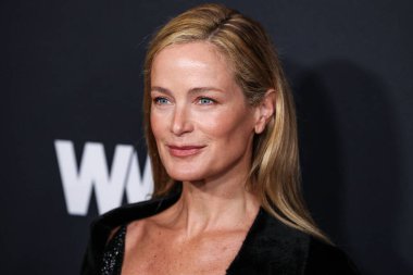 American model Carolyn Murphy wearing an archive Donna Karan collection look from Fall 2001 arrives at the 2026 2nd Annual WWD (Women's Wear Daily) Style Awards, Golden Globes held at the Regent Santa Monica Beach on January 9, 2025 in Santa Monica