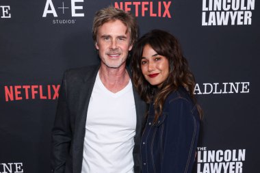 Sam Trammell ve Emmanuelle Chriqui, Los Angeles Netflix 'in ve A + E Studios' un 'The Lincoln Lawyer' sezonunun 4. sezonunu 28 Ocak 2026 'da Los Angeles, Kaliforniya, ABD' deki Penske Medya Kurumu 'nda gerçekleştirdiler.