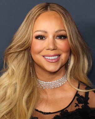 Mariah Carey 'in üzerinde Prada, Leviev Elmas mücevheri, Etho Maria mücevheri, 30 Ocak 2026' da Los Angeles Kongre Merkezi Güney Salonu 'nda düzenlenen Mariah Carey onuruna düzenlenen MusiCares 2026' ya ulaştı.