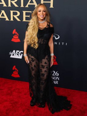 Mariah Carey 'in üzerinde Prada, Leviev Elmas mücevheri, Etho Maria mücevheri, 30 Ocak 2026' da Los Angeles Kongre Merkezi Güney Salonu 'nda düzenlenen Mariah Carey onuruna düzenlenen MusiCares 2026' ya ulaştı.