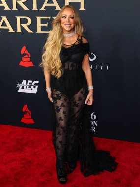 Mariah Carey 'in üzerinde Prada, Leviev Elmas mücevheri, Etho Maria mücevheri, 30 Ocak 2026' da Los Angeles Kongre Merkezi Güney Salonu 'nda düzenlenen Mariah Carey onuruna düzenlenen MusiCares 2026' ya ulaştı.
