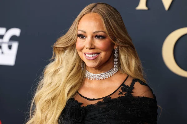 Mariah Carey 'in üzerinde Prada, Leviev Elmas mücevheri, Etho Maria mücevheri, 30 Ocak 2026' da Los Angeles Kongre Merkezi Güney Salonu 'nda düzenlenen Mariah Carey onuruna düzenlenen MusiCares 2026' ya ulaştı.