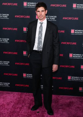 Tanner Novlan, 11 Mart 2026 'da Beverly Wilshire, A Four Seasons Hotel' de düzenlenen Kadın Kanser Araştırmaları Fonu 'nun Unutulmaz Akşam Yardım Galası' na geldi..