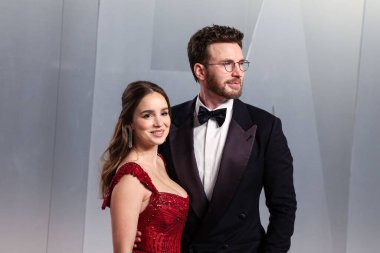 Alba Baptista and husband Chris Evans arrive at the 2026 Vanity Fair Oscar Party (98th Annual Academy Awards) Hosted By Mark Guiducci held at David Geffen Galleries at Los Angeles County Museum of Art (LACMA) at 5905 Wilshire Blvd on March 15, 2026