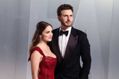 Alba Baptista and husband Chris Evans arrive at the 2026 Vanity Fair Oscar Party (98th Annual Academy Awards) Hosted By Mark Guiducci held at David Geffen Galleries at Los Angeles County Museum of Art (LACMA) at 5905 Wilshire Blvd on March 15, 2026