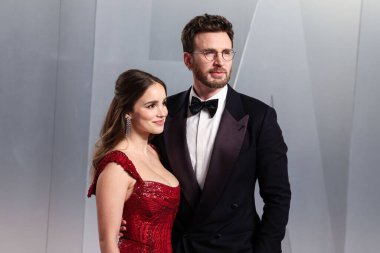 Alba Baptista and husband Chris Evans arrive at the 2026 Vanity Fair Oscar Party (98th Annual Academy Awards) Hosted By Mark Guiducci held at David Geffen Galleries at Los Angeles County Museum of Art (LACMA) at 5905 Wilshire Blvd on March 15, 2026
