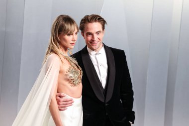 Suki Waterhouse wearing Tamara Ralph and boyfriend Robert Pattinson wearing Dior arrive at the 2026 Vanity Fair Oscar Party (98th Annual Academy Awards) Hosted By Mark Guiducci held at the David Geffen Galleries at the Los Angeles County Museum