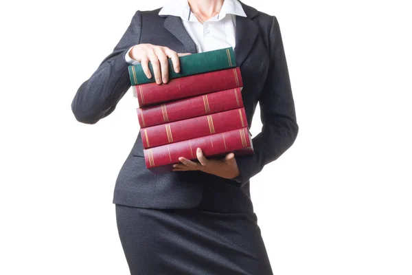 Foto recortada de uma mulher de negócios ou de um cortador de relva segurando uma pilha de livros. — Fotografia de Stock