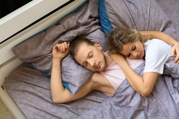 Couple is sleeping in bed. Recovery and healthy sleep concept. — стоковое фото