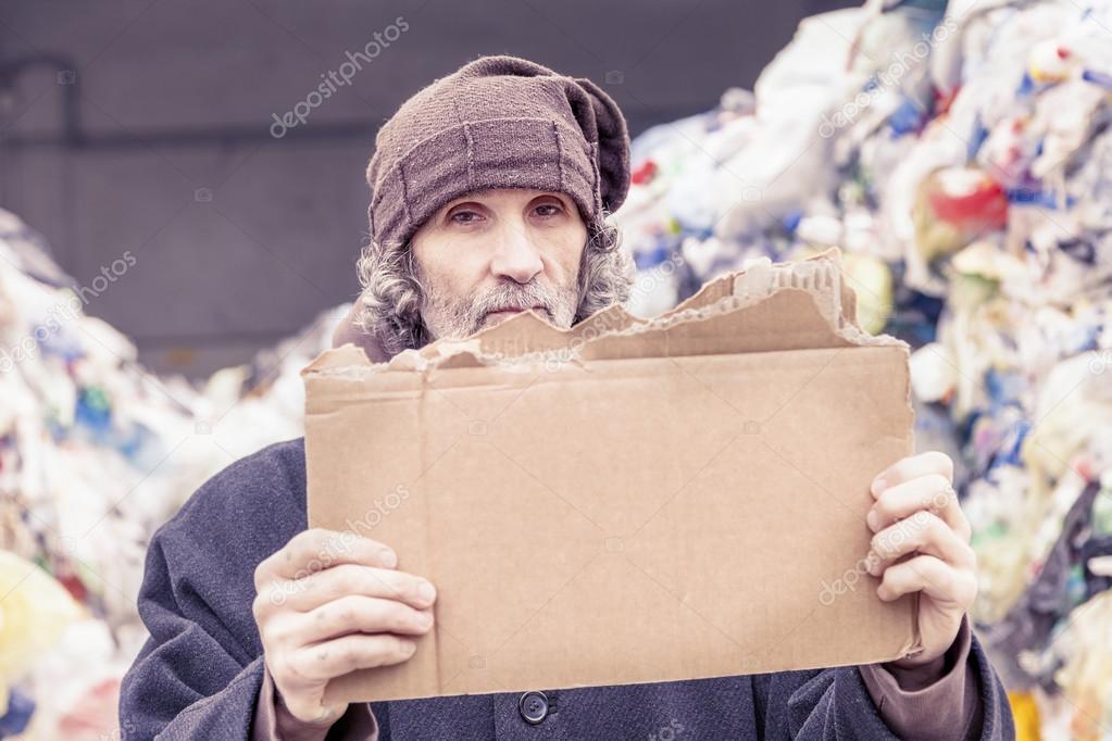 homeless show a empty cardboard