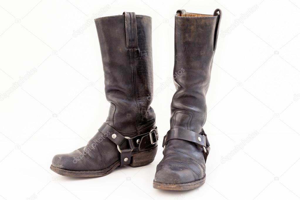 black pair of vintage boots isolated on white background