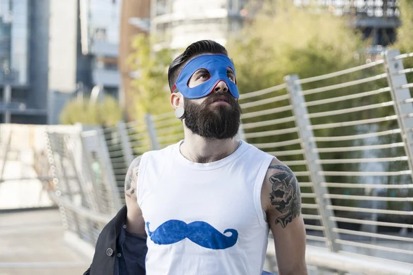 Young hipster superhero fights evil — Stock Photo, Image