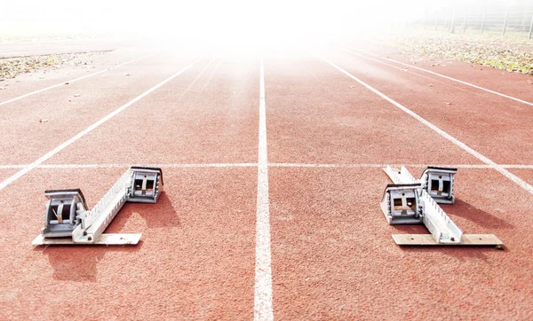 Startgroparna på running spår — Stockfoto