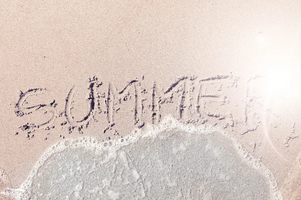 Écrit sur sable mouillé par les vagues — Photo