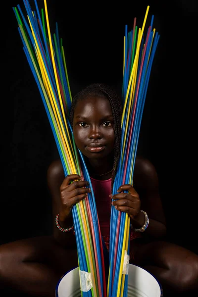 Young African Girl Playing Long Colorful Drinking Straws Studio Shot — Stock Photo, Image